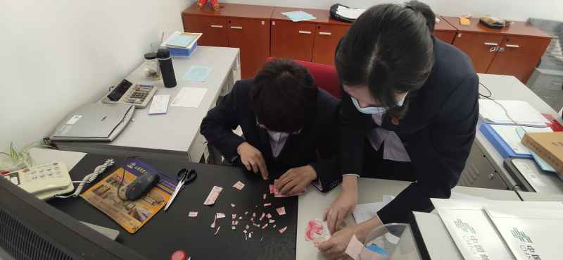 中行秦皇岛山海关支行为客户拼接残损币获赞